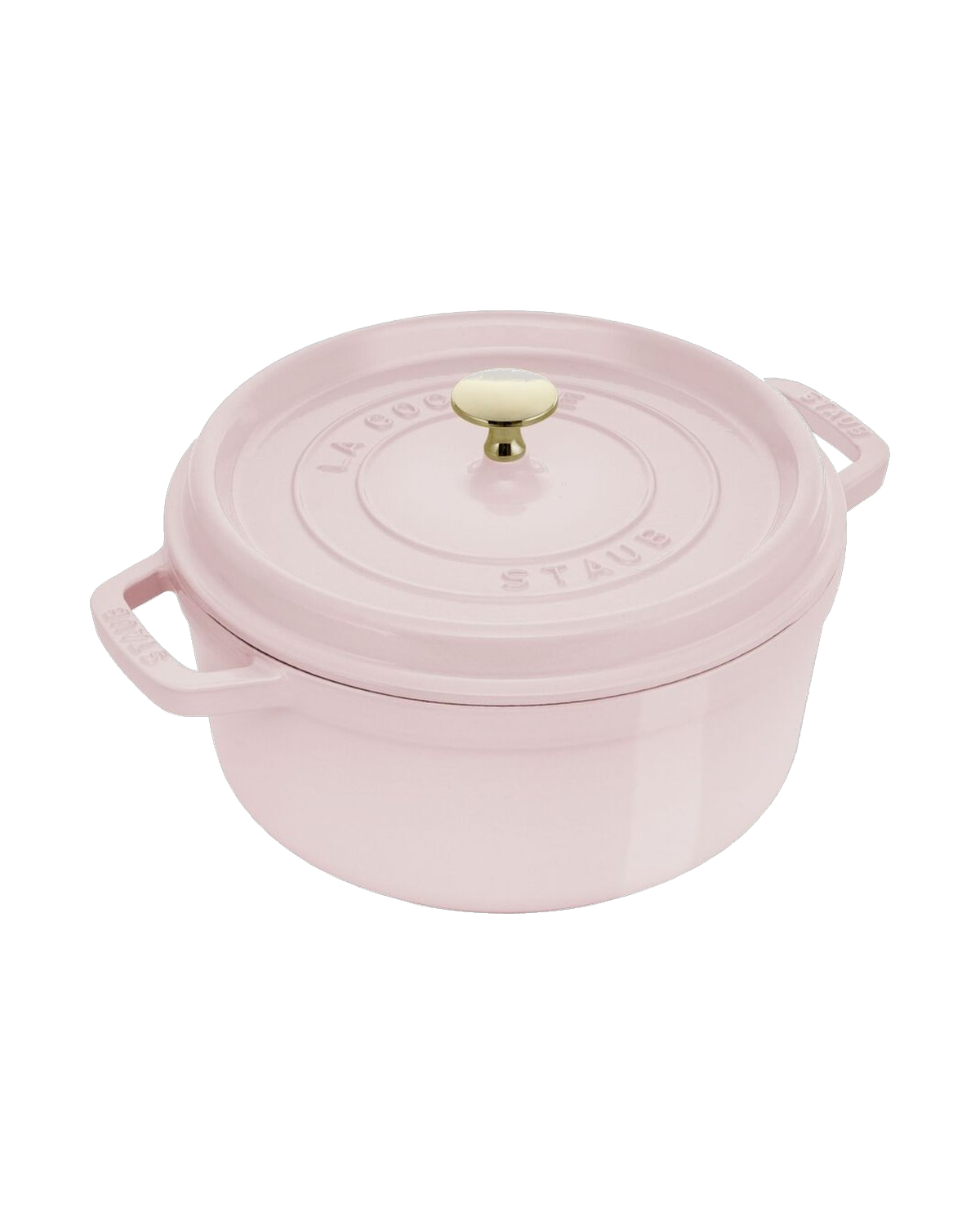 A pale pink cast iron cocotte with a brass knob